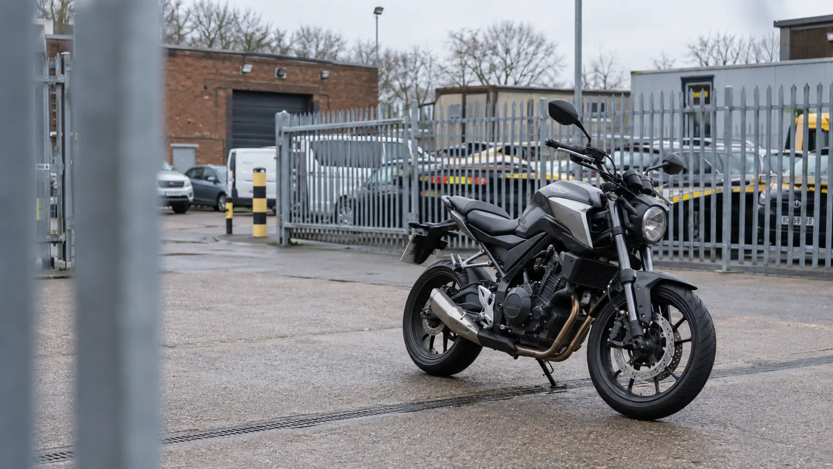 A motorcycle inside a secure UK vehicle recovery compound